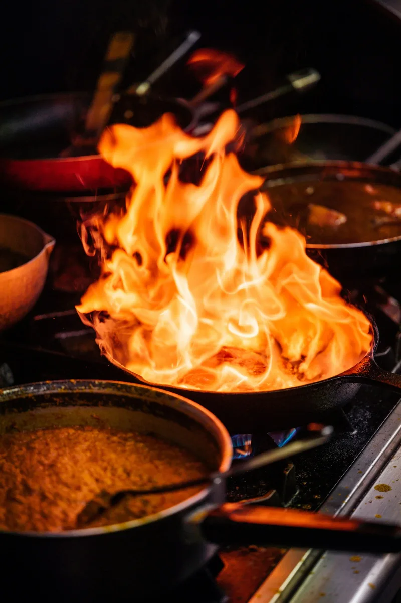 Atmospheric kitchen flame with no recognisable person