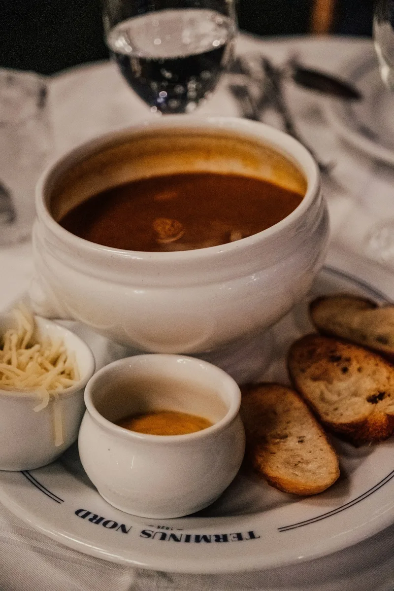 Warm classic soup image with bread and cheese