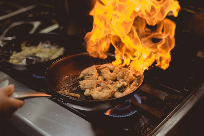 Active pan and anonymous hand bring human energy to the kitchen story